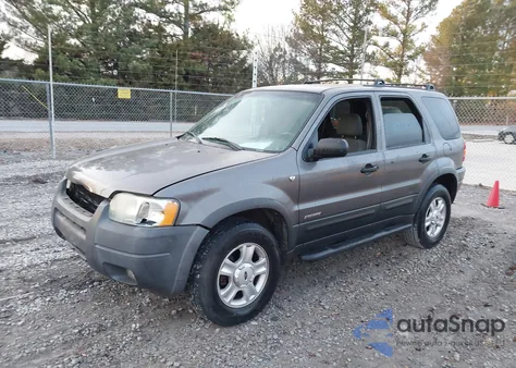 2002 Ford Escape Xlt z USA, uszkodzony, nr VIN 1FMYU03102KD68564